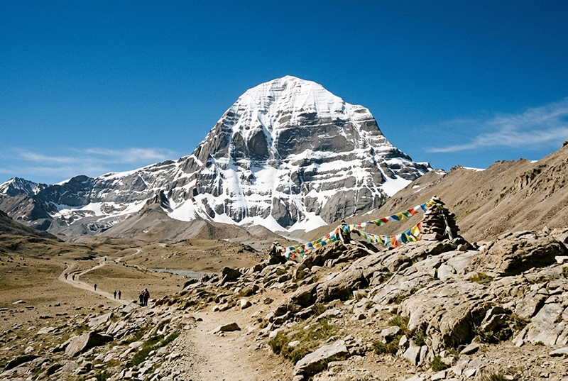 Lake Manasarovar at sunrise during private Mount Kailash Yatra — sacred bathing rituals